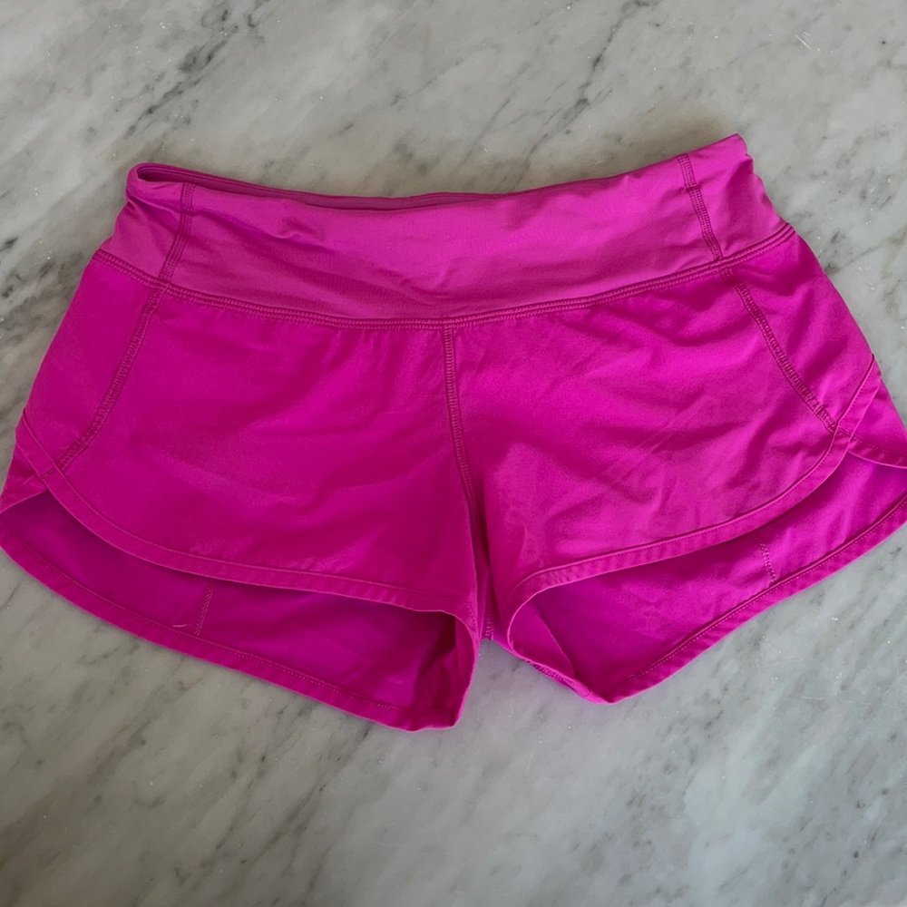 Hot pink running shorts
